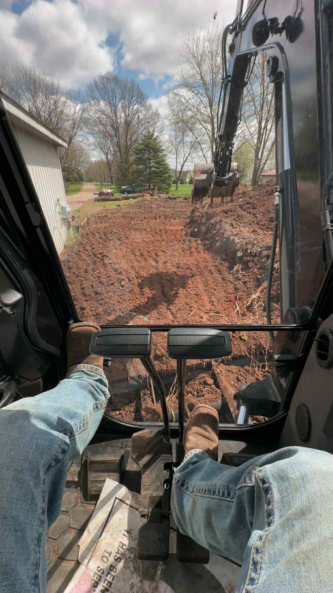 CAT excavator on job site