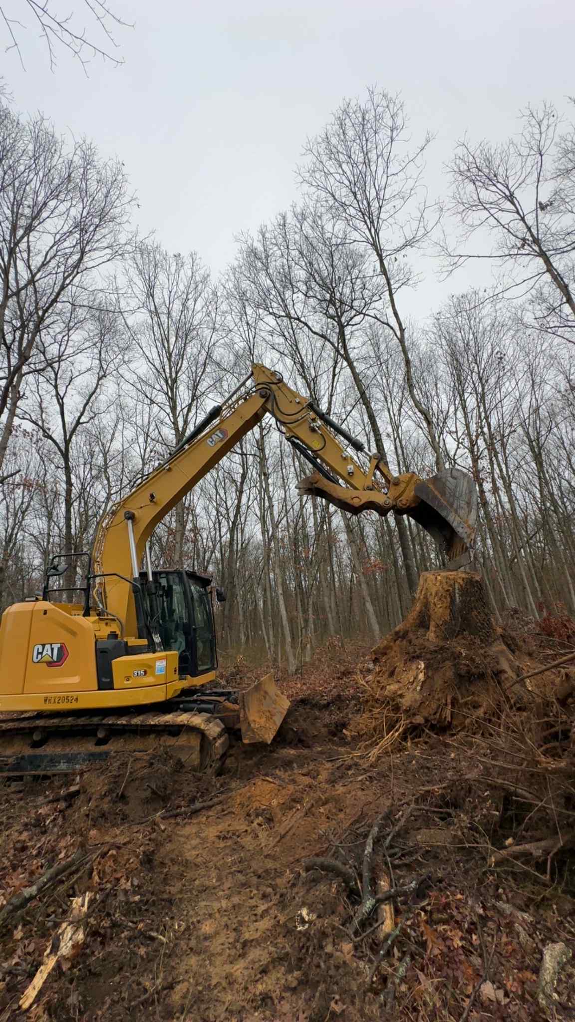 Excavator performing land work